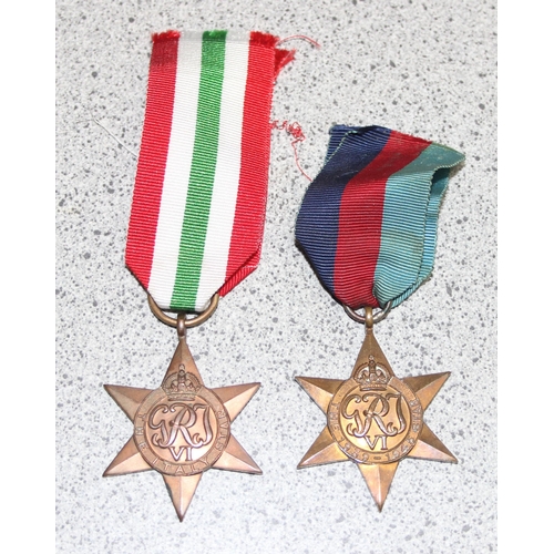 1469 - A WW2 military medals to inc an Italy Star and a WW2 period Soldiers pay book and paperwork