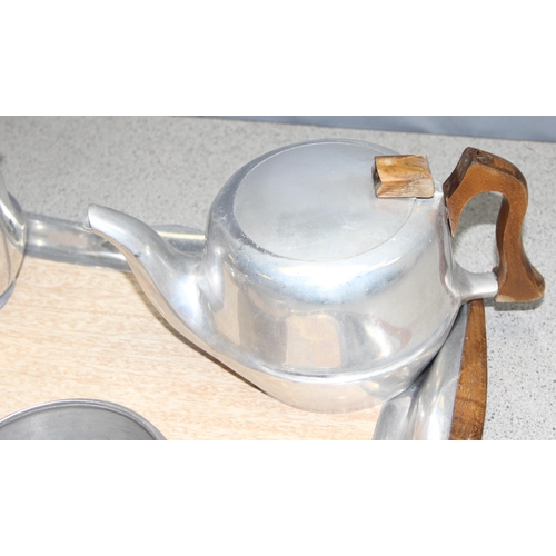 1091 - A retro Picquot ware 4 piece aluminium tea set with tray