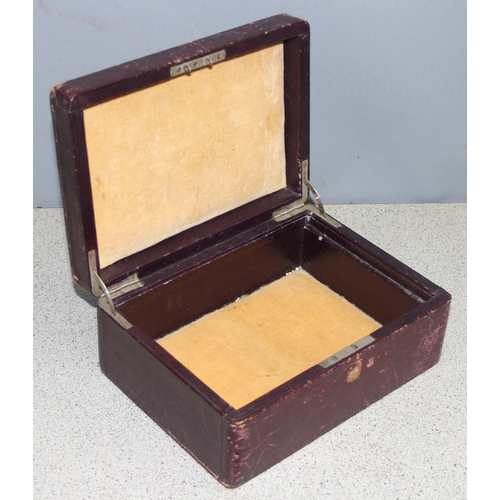 1170 - An antique Moroccan leather jewellery box and contents