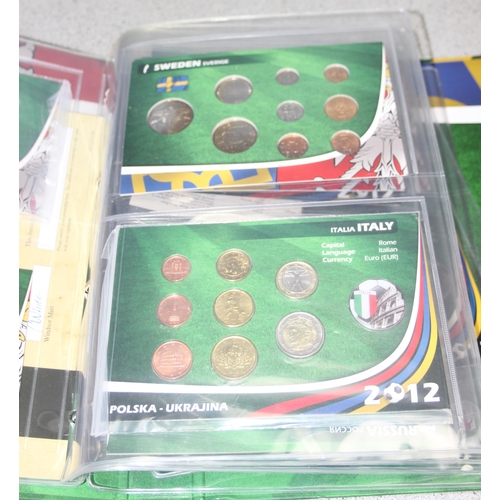 1249 - Euro 2012 commemorative football coins in albums, mainly Euros