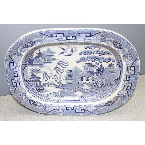 1699N - 2 large antique blue & white meat plates, Willow pattern approx 45cm x 37cm & another smaller exampl... 