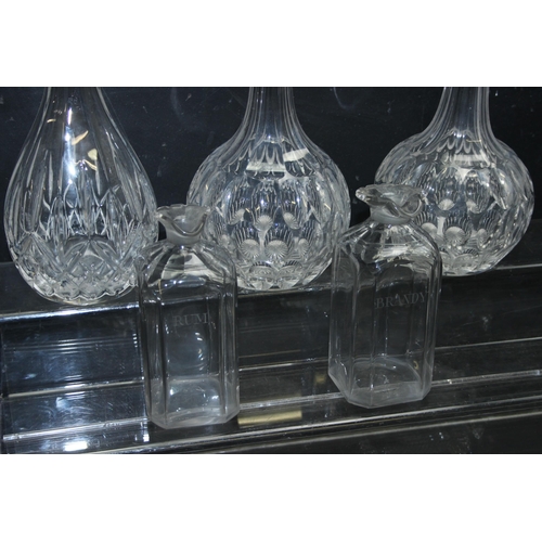 1699P - Qty of good quality antique glassware, 2 heavy cut glass bowls, 5 decanters to inc 2 engraved and 2 ... 