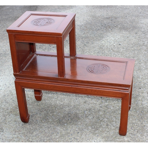 196 - A vintage Chinese carved hardwood asymmetric 2 tier end table, approx 71cm wide x 33cm deep x 67cm t... 