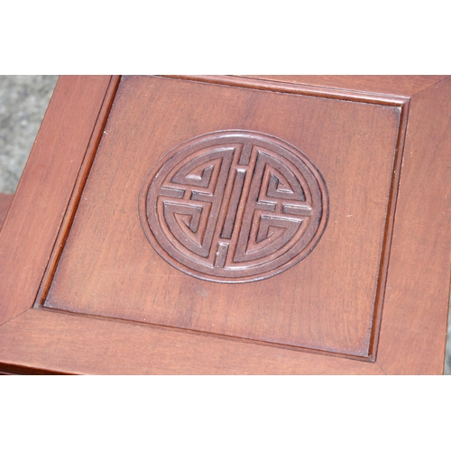 196 - A vintage Chinese carved hardwood asymmetric 2 tier end table, approx 71cm wide x 33cm deep x 67cm t... 