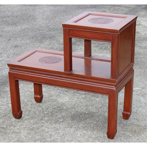 196 - A vintage Chinese carved hardwood asymmetric 2 tier end table, approx 71cm wide x 33cm deep x 67cm t... 