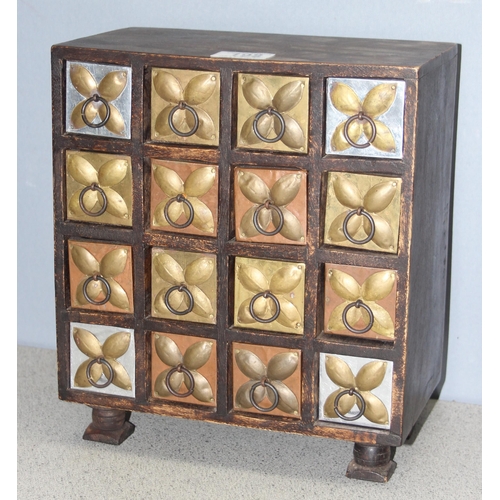 198 - A small rustic table top collectors chest of drawers, 16 drawers with metal mountings, approx 25cm w... 