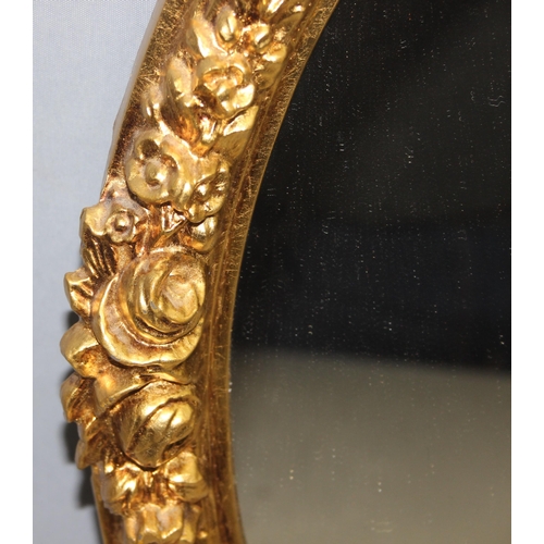 483 - An antique style oval gilt framed mirror, approx 58cm x 47cm