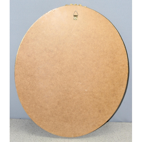 483 - An antique style oval gilt framed mirror, approx 58cm x 47cm
