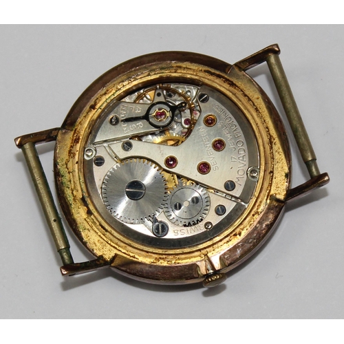 1335 - A vintage Movado wristwatch with 17 jewel mechanical movement, plain face with baton numerals and go... 