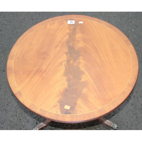 56 - A small antique style mahogany tilt top table, approx 63cm wide x 53cm tall