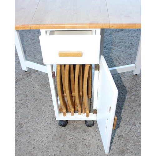 139A - Dropleaf folding table with folding chairs contained in base, approx 139cm/ 33cm wide x 87cm deep x ... 