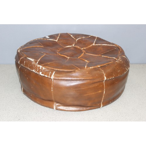 23 - Vintage leather footstool or pouffe, approx 53cm wide x 19cm tall