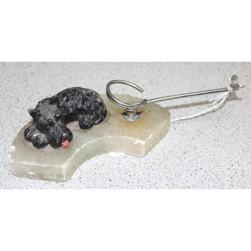 1699W - An Art Deco period cold painted spelter model of a black Scottie dog on marble base with pipe rack, ... 