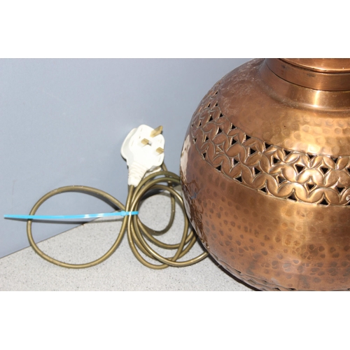 233 - North African style spherical pierced copper lamp base, approx 47cm tall