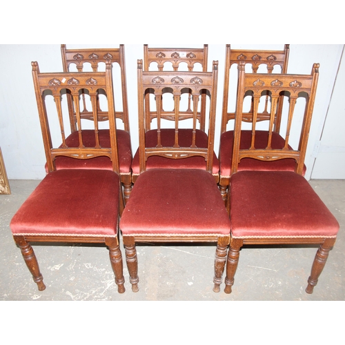 24 - A set of 6 Art Nouveau period oak dining chairs with carved details and upholstered seats, each appr... 