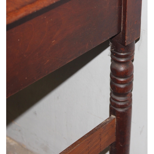 25 - An antique mahogany side or console table with 2 drawers and turned legs, approx 91cm wide x 43cm de... 