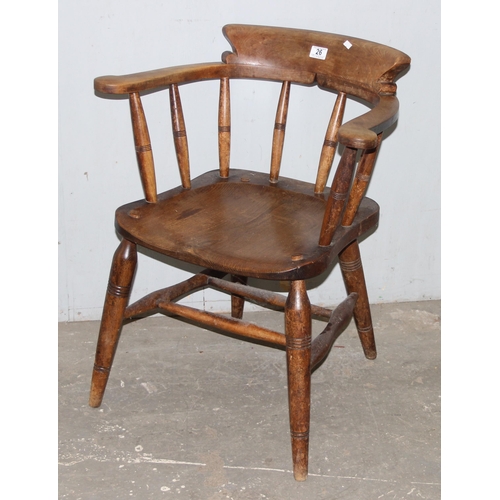 26 - A pair of vintage Oak smoker's bow or captain's armchairs, dated 1934/1935 to seat, made by O Haines... 