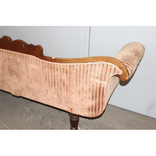 28 - A Regency period mahogany scroll arm sofa, circa 1820, the undulating back, arms, squab and bolster ... 