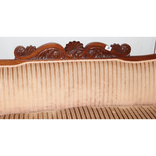 28 - A Regency period mahogany scroll arm sofa, circa 1820, the undulating back, arms, squab and bolster ... 