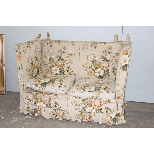 29 - A vintage floral patterned Knoll or Knole sofa with drop ends, approx 164cm wide x 79cm deep x 119cm... 