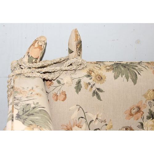 29 - A vintage floral patterned Knoll or Knole sofa with drop ends, approx 164cm wide x 79cm deep x 119cm... 