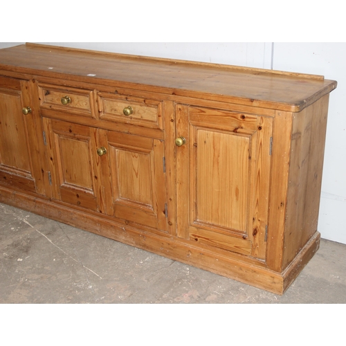 3 - Vintage pine farmhouse sideboard with 2 central drawers and 4 cupboards, brass handles, approx 205cm... 