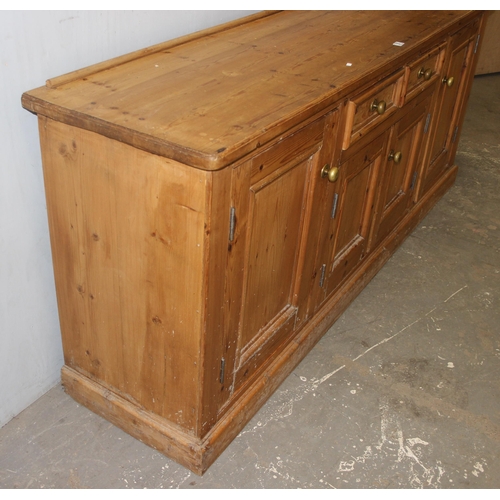 3 - Vintage pine farmhouse sideboard with 2 central drawers and 4 cupboards, brass handles, approx 205cm... 