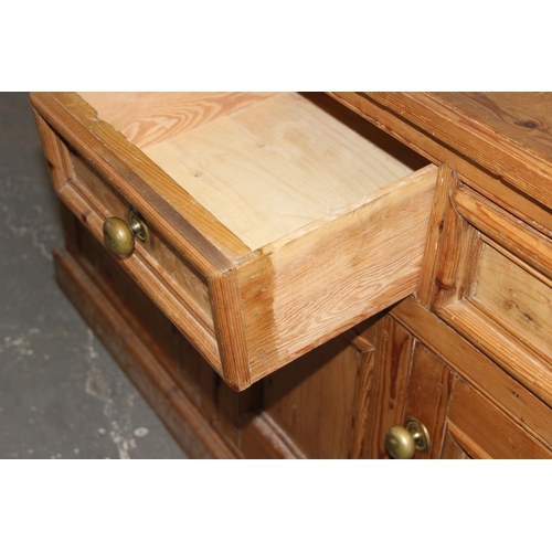 3 - Vintage pine farmhouse sideboard with 2 central drawers and 4 cupboards, brass handles, approx 205cm... 