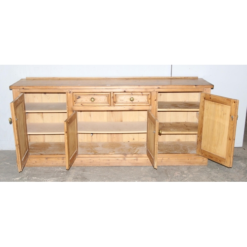 3 - Vintage pine farmhouse sideboard with 2 central drawers and 4 cupboards, brass handles, approx 205cm... 