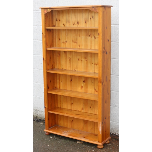 79 - A modern pine bookcase, approx 96cm wide x 28cm deep x 182cm tall