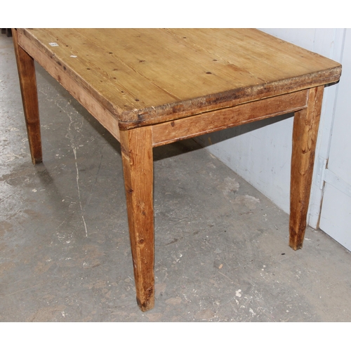 7 - An antique pine farmhouse kitchen table with single drawer, approx 137cm wide x 79cm deep x 78cm tal... 