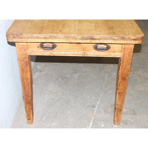 7 - An antique pine farmhouse kitchen table with single drawer, approx 137cm wide x 79cm deep x 78cm tal... 