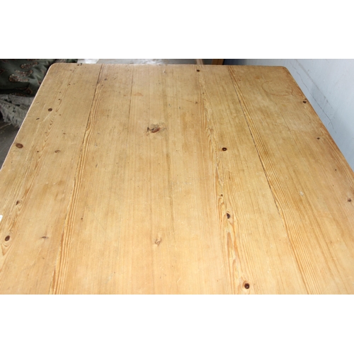 7 - An antique pine farmhouse kitchen table with single drawer, approx 137cm wide x 79cm deep x 78cm tal... 