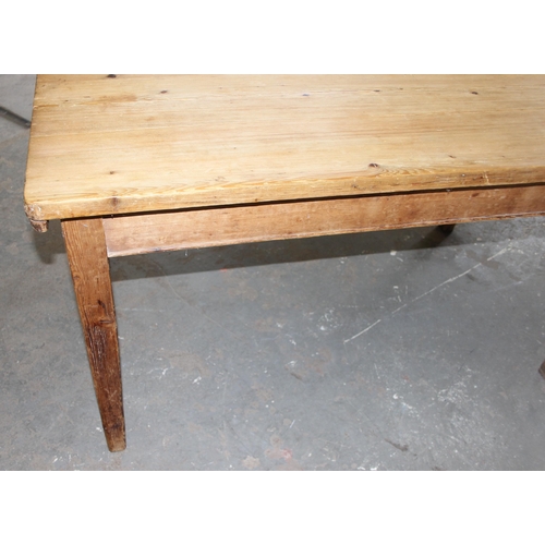 7 - An antique pine farmhouse kitchen table with single drawer, approx 137cm wide x 79cm deep x 78cm tal... 