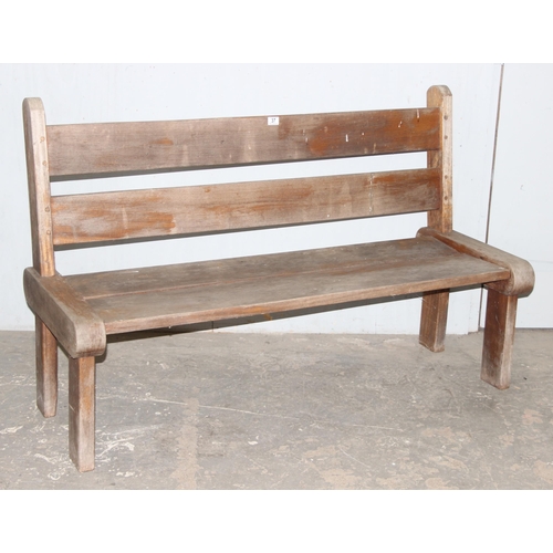 37 - Hardwood garden bench, possibly Teak, approx 150cm wide x 60cm deep x 97cm tall - matching next lot