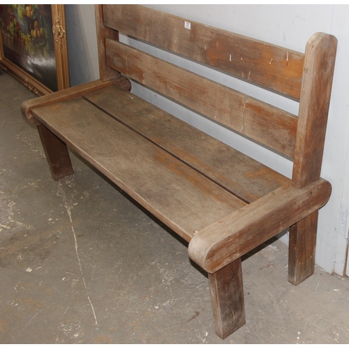 37 - Hardwood garden bench, possibly Teak, approx 150cm wide x 60cm deep x 97cm tall - matching next lot