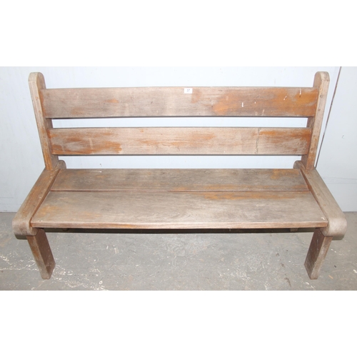 37 - Hardwood garden bench, possibly Teak, approx 150cm wide x 60cm deep x 97cm tall - matching next lot