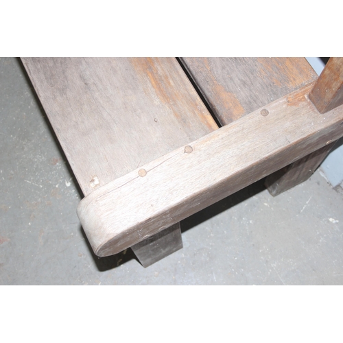 37 - Hardwood garden bench, possibly Teak, approx 150cm wide x 60cm deep x 97cm tall - matching next lot