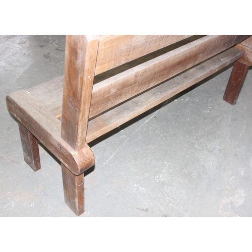 37 - Hardwood garden bench, possibly Teak, approx 150cm wide x 60cm deep x 97cm tall - matching next lot