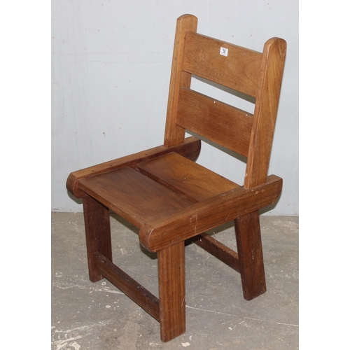 38 - A set of 4 hardwood garden chairs, possibly Teak, each approx 50cm wide x 56cm deep x 97cm tall, mat... 