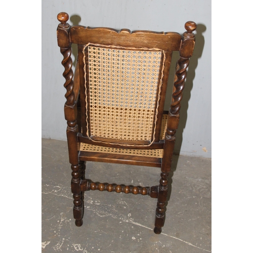 46 - A set of 4 oak and bergere chairs, 2 dining and 2 carver, with barleytwist supports, likely early 20... 