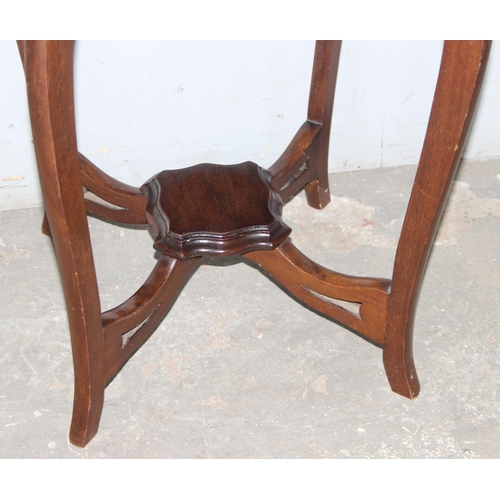 56 - A vintage mahogany side table with shaped top, approx 47cm wide x 47cm deep x 66cm tall