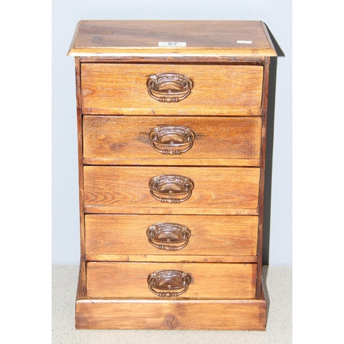 57 - A small vintage stained pine 5 drawer collectors chest with brass handles, approx 30cm wide x 17cm d... 