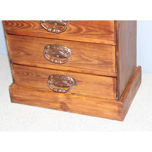 57 - A small vintage stained pine 5 drawer collectors chest with brass handles, approx 30cm wide x 17cm d... 