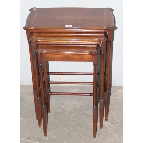 60 - An Edwardian Sheraton Revival period nest of 3 tables, the largest approx 57cm wide x 37cm deep x 67... 