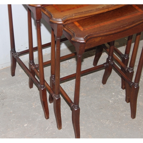 60 - An Edwardian Sheraton Revival period nest of 3 tables, the largest approx 57cm wide x 37cm deep x 67... 