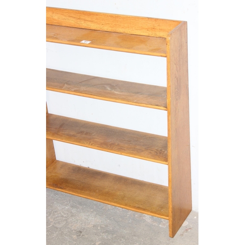 61 - Vintage light oak bookcase, approx 77cm wide x 23cm deep x 92cm tall