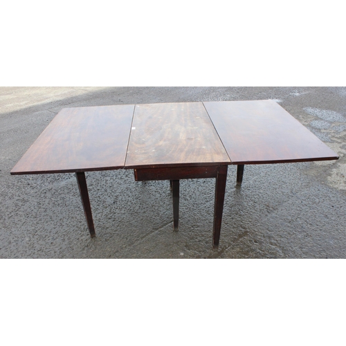 65 - An antique mahogany dropleaf table, approx 190cm wide x 118cm deep x 73cm tall when raised