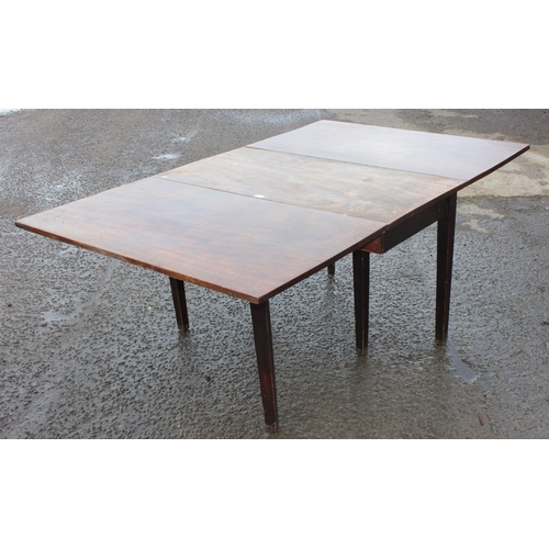 65 - An antique mahogany dropleaf table, approx 190cm wide x 118cm deep x 73cm tall when raised