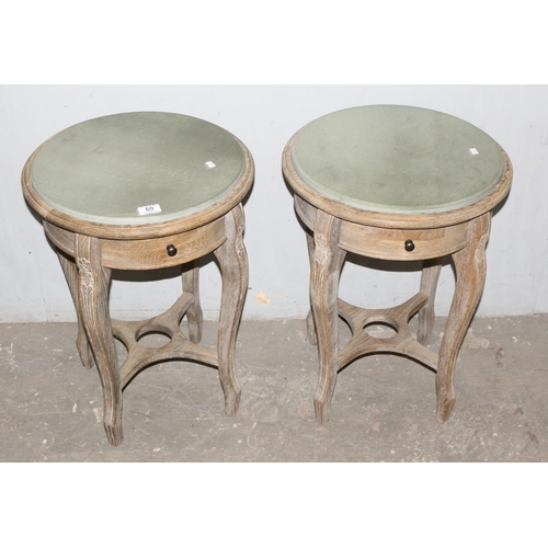 69 - A pair of limed oak and marble topped bedside tables with single drawer, approx 46cm wide x 46cm dee... 